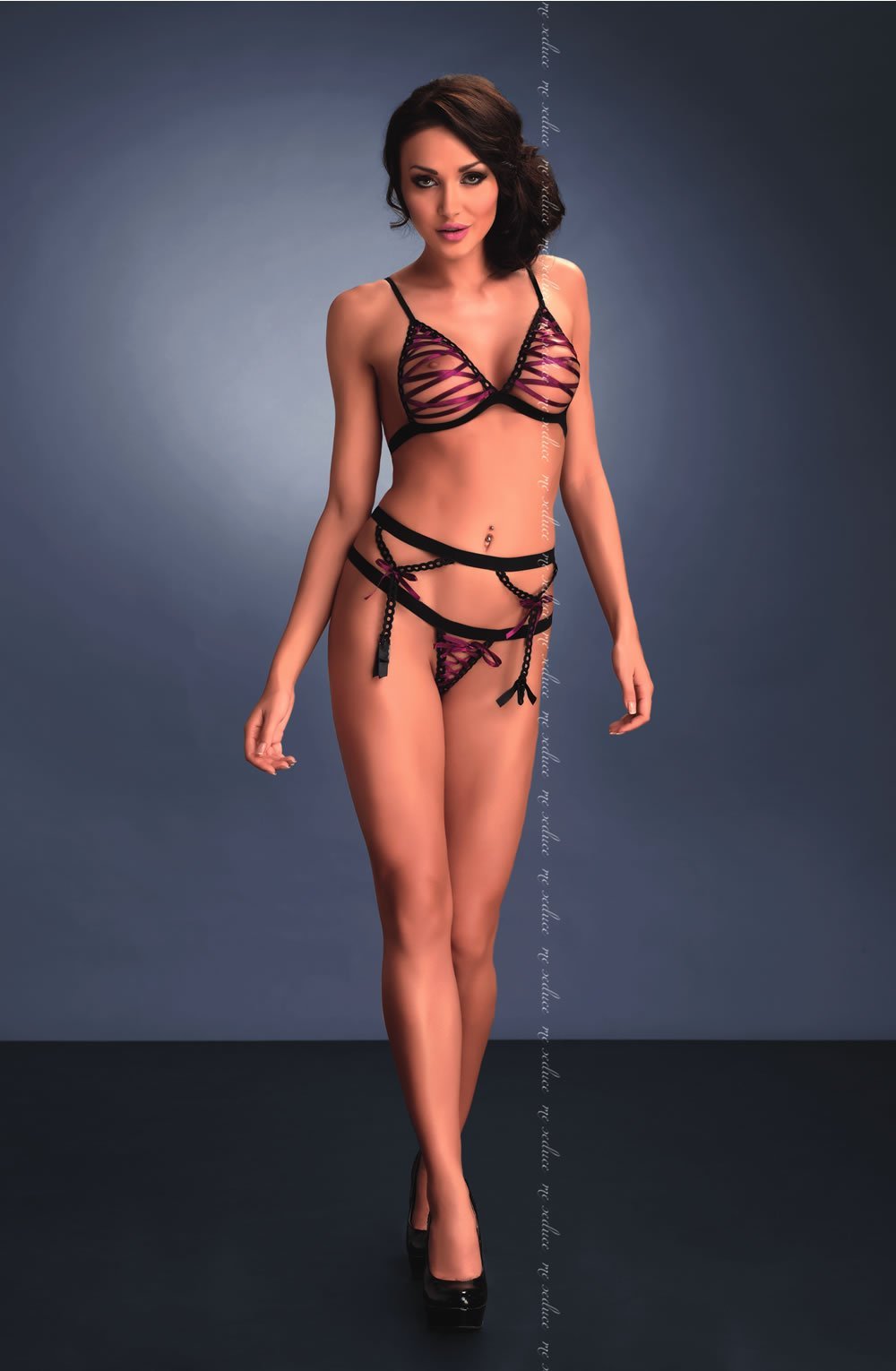 Me Seduce Rosa Black bra set with sheer striped cups, matching strappy thong, and black high heels