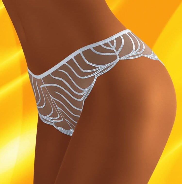 Wolbar Soleare thong with sheer fabric and white abstract pattern, shown on model against yellow background