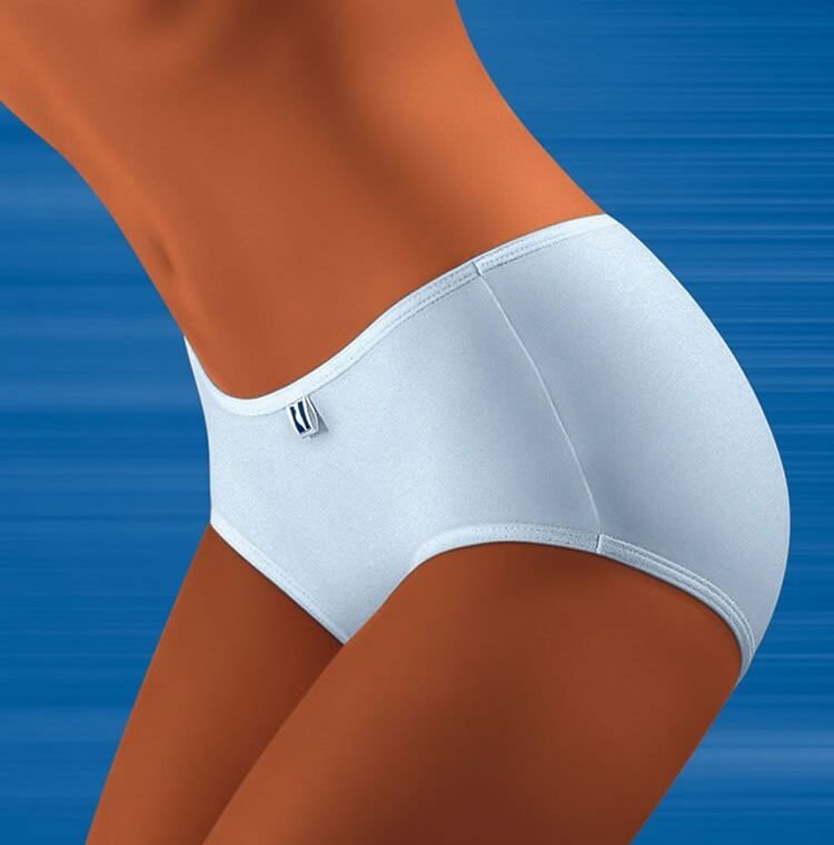Wolbar women's mini briefs in light color with small front logo tag, shown on model against blue background