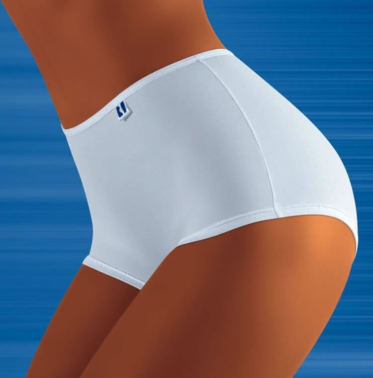 Wolbar Tahoo white high-waisted shorts with logo tag against blue background